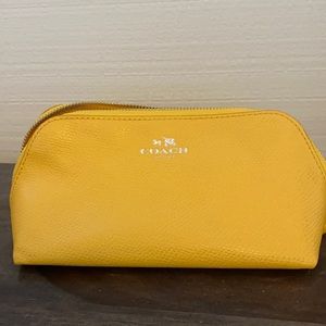 NWOT COACH mustard pouch leather bag